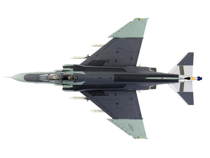 Top-down view of a fighter jet on a white background