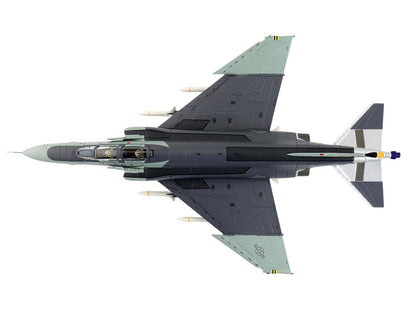Top-down view of a fighter jet on a white background