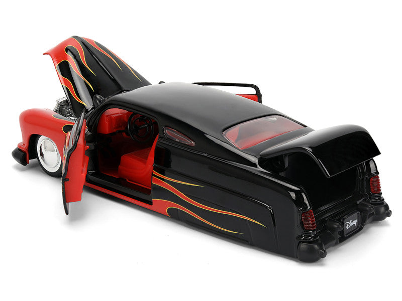 Black and red model car with open doors on a white background