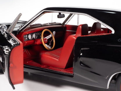 Close-up of a classic car's interior with red seats and black dashboard.