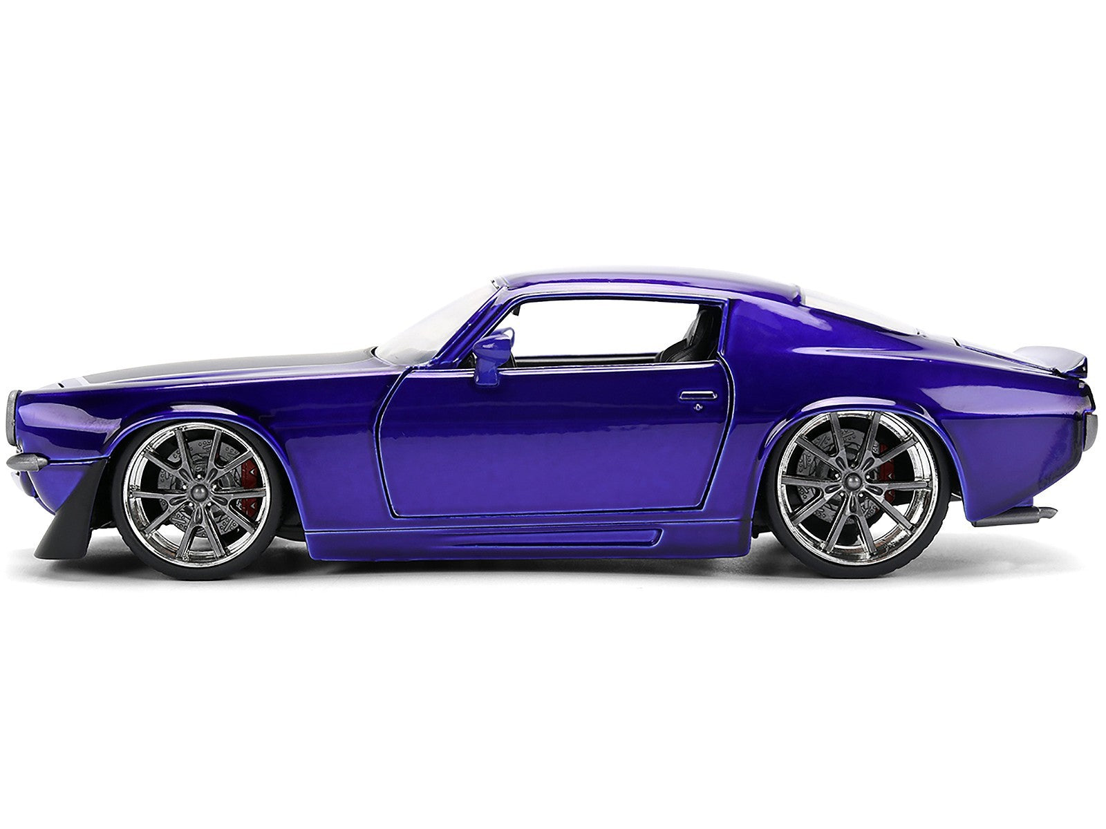 Purple car with large wheels on a white background