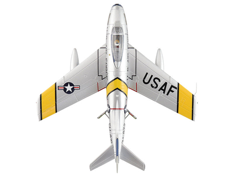 Model airplane with 'USAF' on a white background
