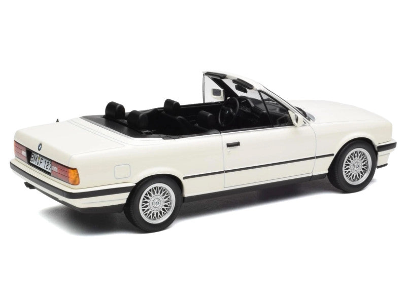 Model of a white BMW convertible on a white background