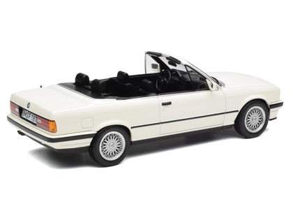 Model of a white BMW convertible on a white background