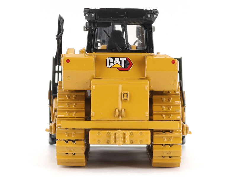 Yellow toy bulldozer with CAT logo on a white background