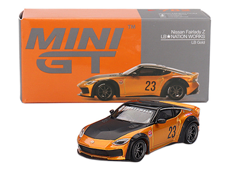 Orange and black toy car with number 23 in front of its packaging, featuring the Mini GT logo.