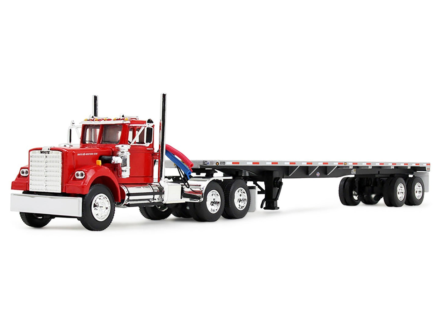 Model of a red truck with a flatbed trailer on a white background