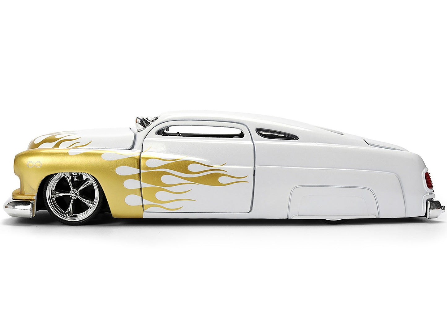Model car with gold flame design on a white background