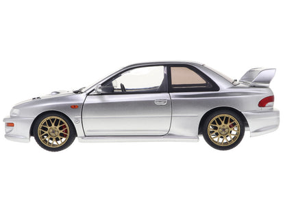 Silver car with gold wheels on a white background