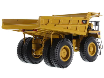Yellow dump truck on a white background