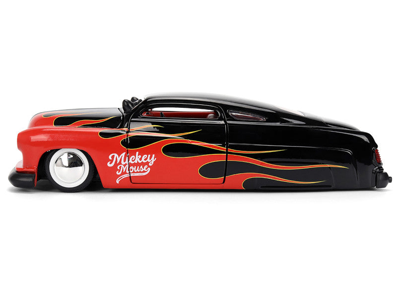 Model car with flame design and 'Mickey Mouse' branding on a white background