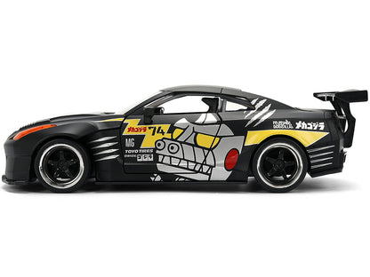 Model car with black, yellow, and white design on a white background