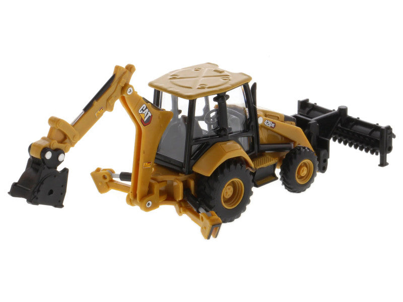 Toy backhoe loader with black and yellow colors on a white background