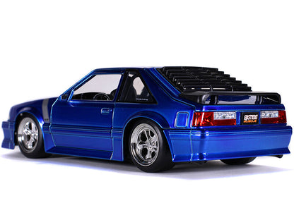 Blue model car on a white background