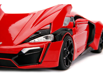 Red sports car model on a white background