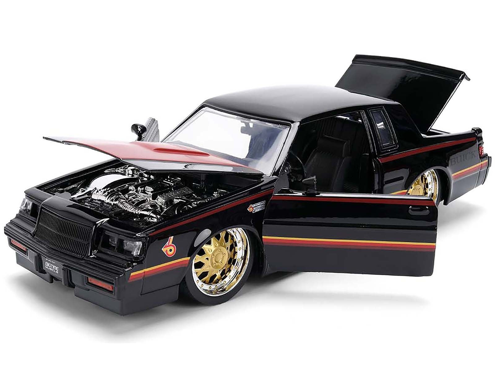 Model car with open hood and doors on a white background