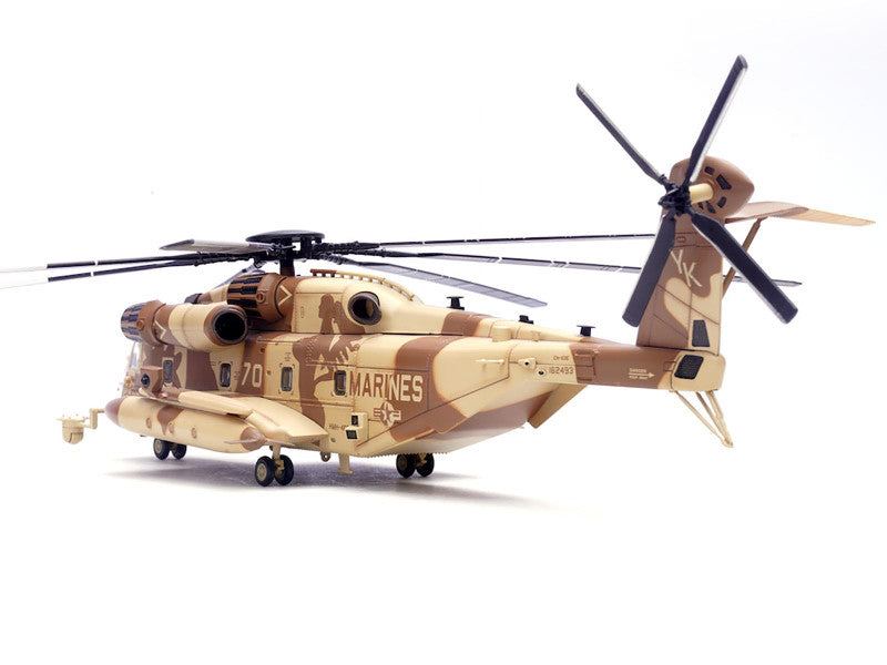 Camouflage helicopter model with 'Marines' branding on a white background