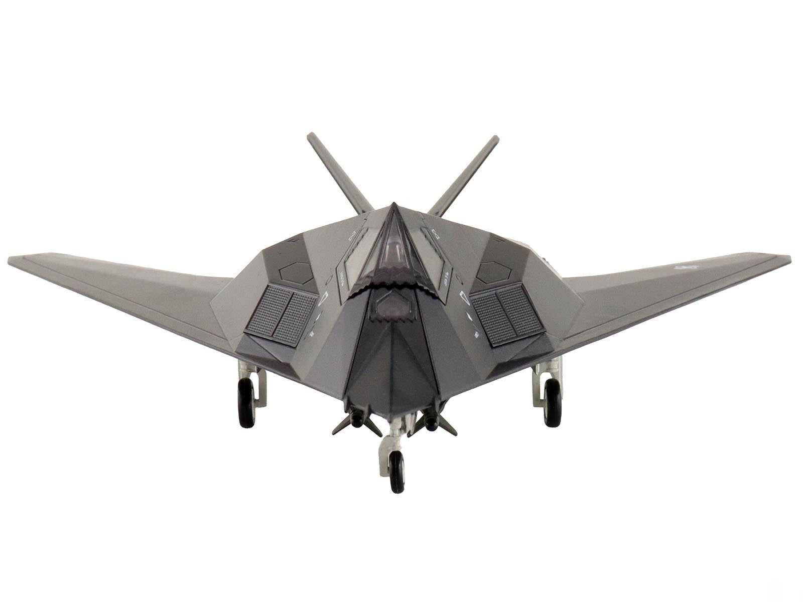Gray fighter jet model on a white background