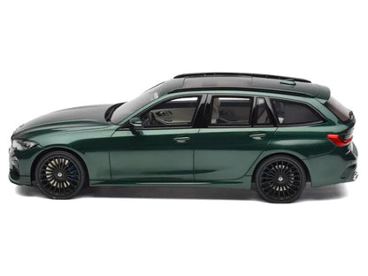 Green car model on a white background