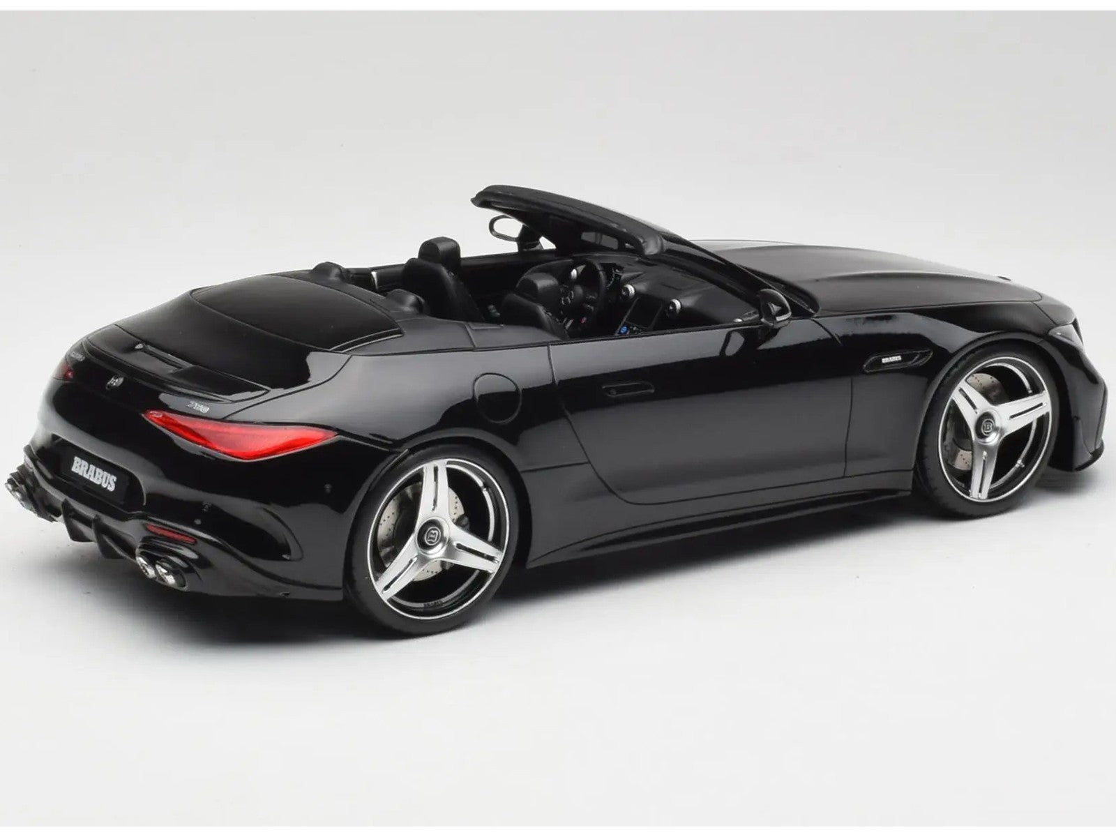 Black convertible car on a white background