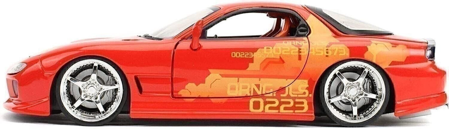 Red toy car with black and orange design on a white background