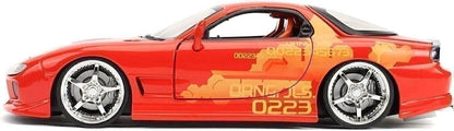Red toy car with black and orange design on a white background