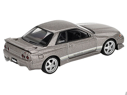 Model car with a textured finish on a white background