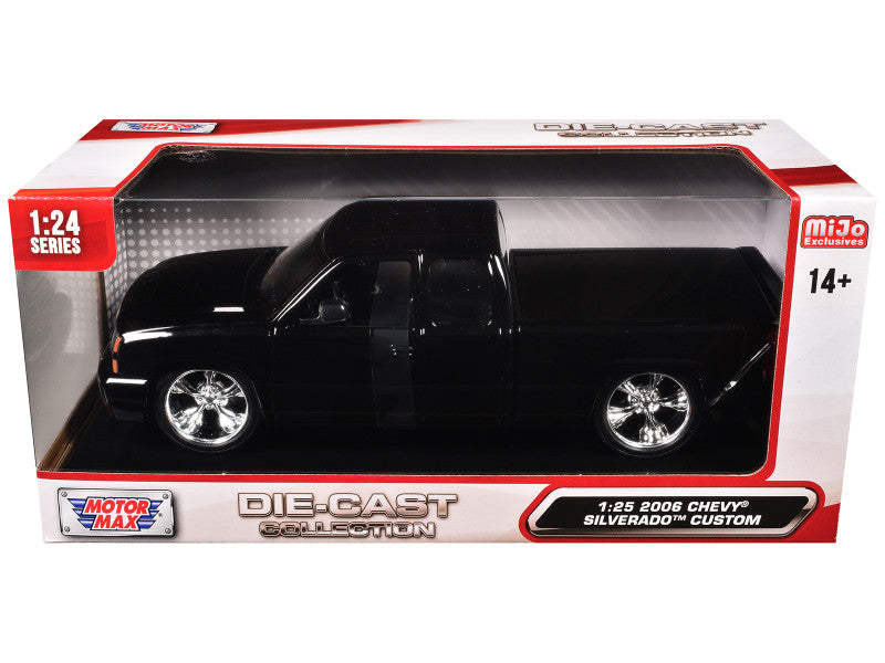 Model truck in packaging with 'Motor Max' branding on a white background