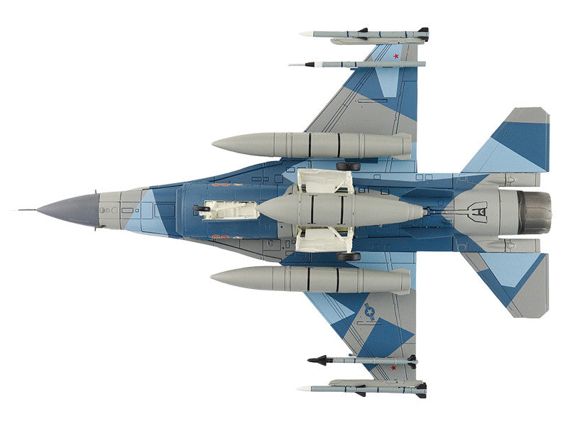 Top-down view of a fighter jet with blue and gray design on a white background