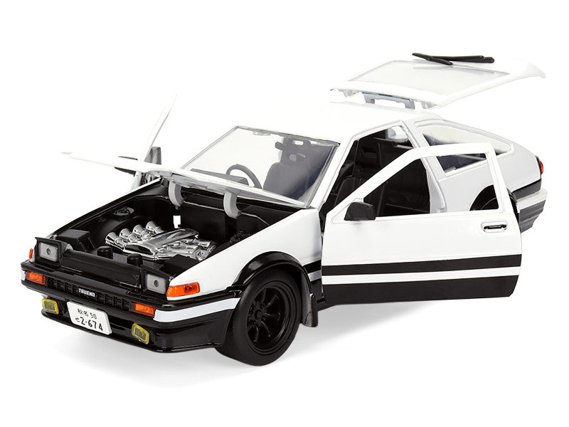 Model car with open hood on a white background