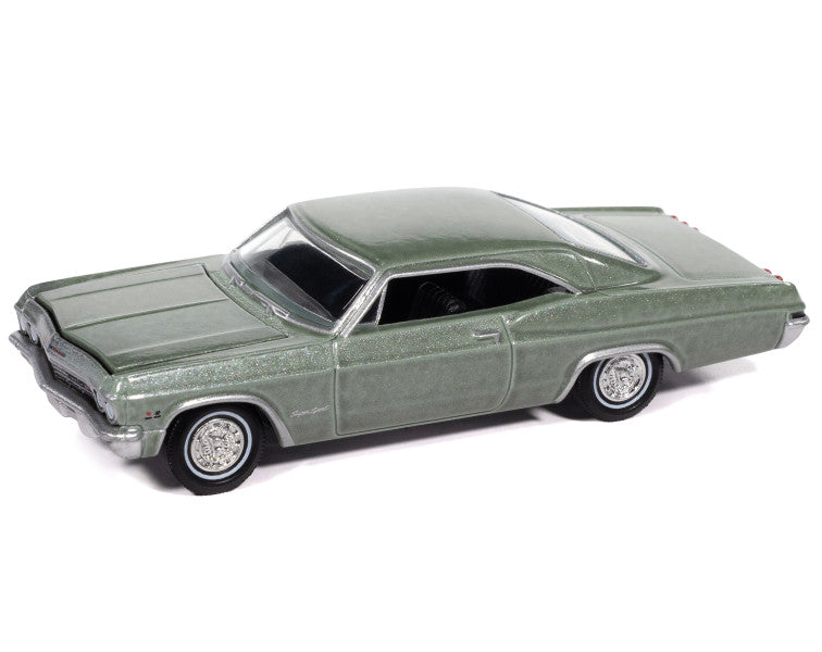 Model of a classic green car on a white background
