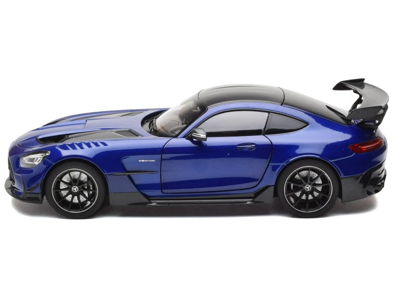 Blue sports car model on a white background
