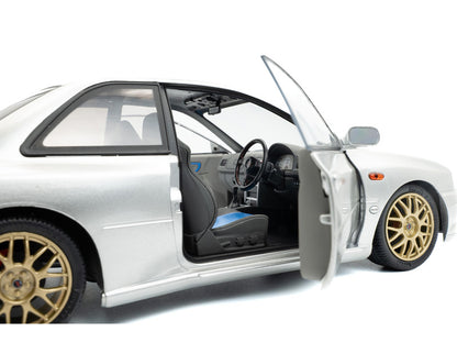 Model car with open door on a white background