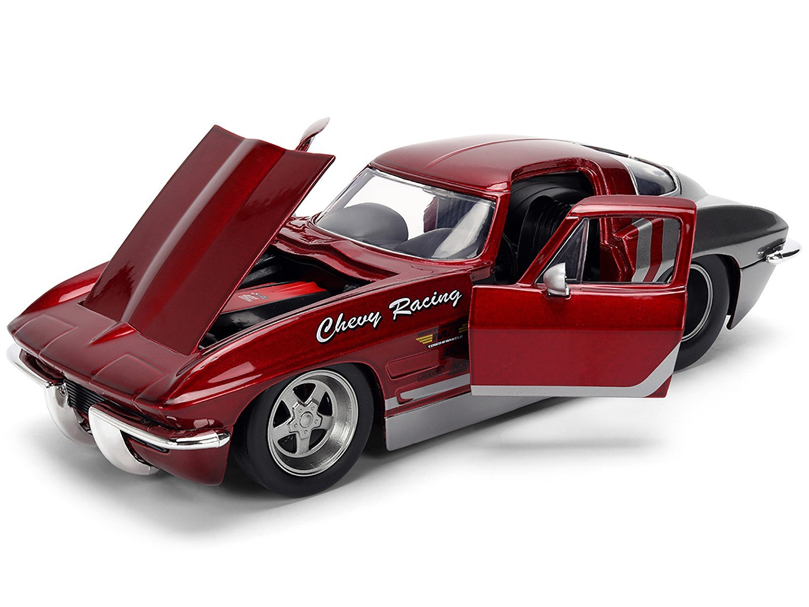 Model car with open doors and hood on a white background