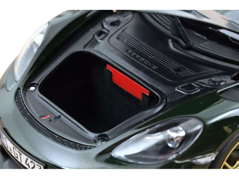 Car hood with a red label on a white background