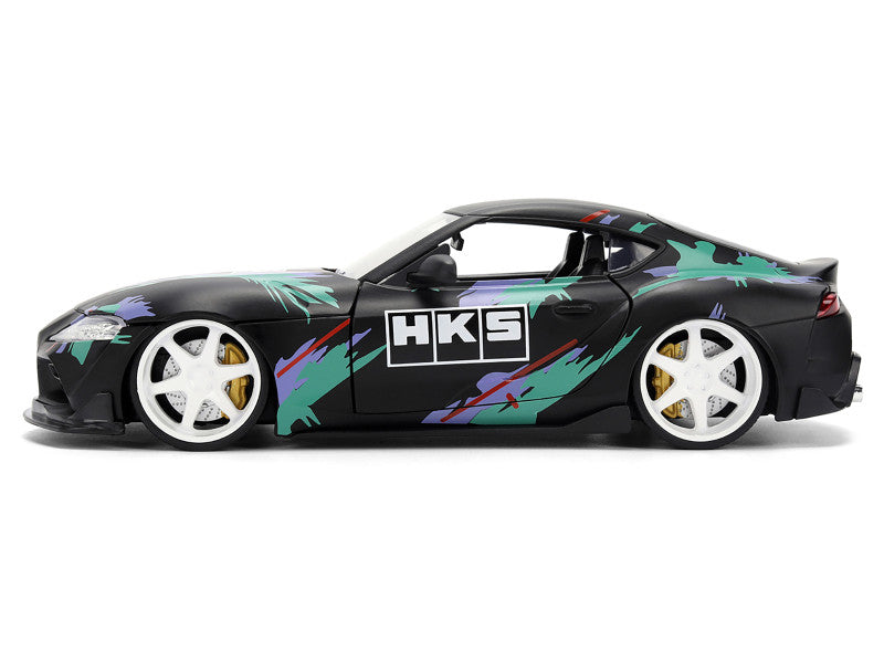 Model car with HKS branding on a white background