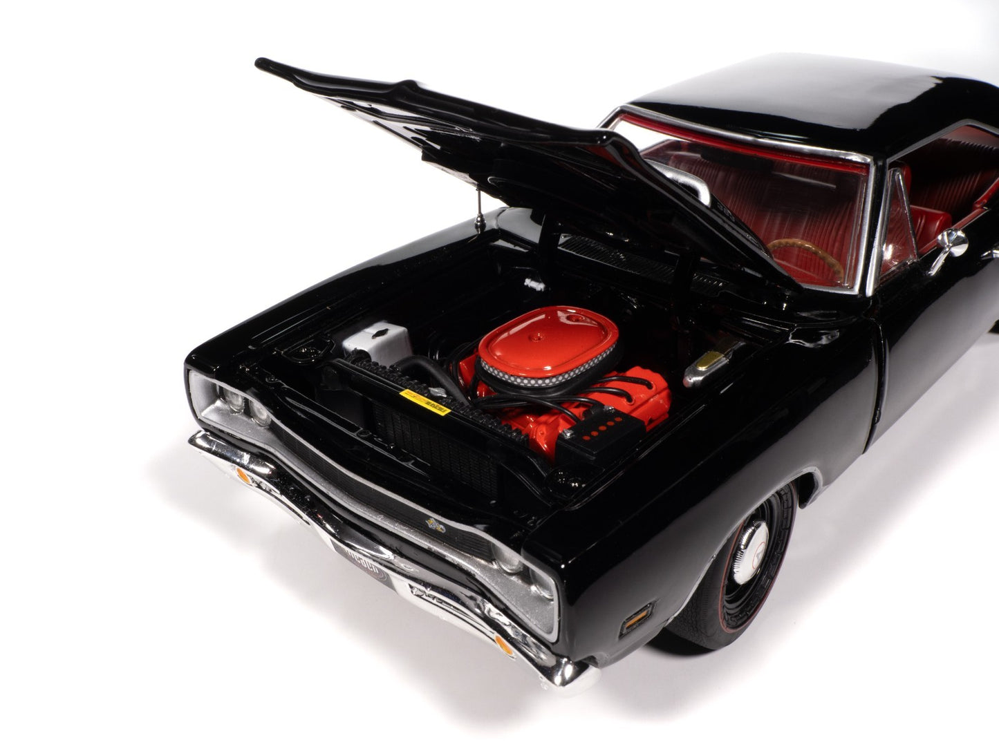 Black muscle car with open hood on a white background
