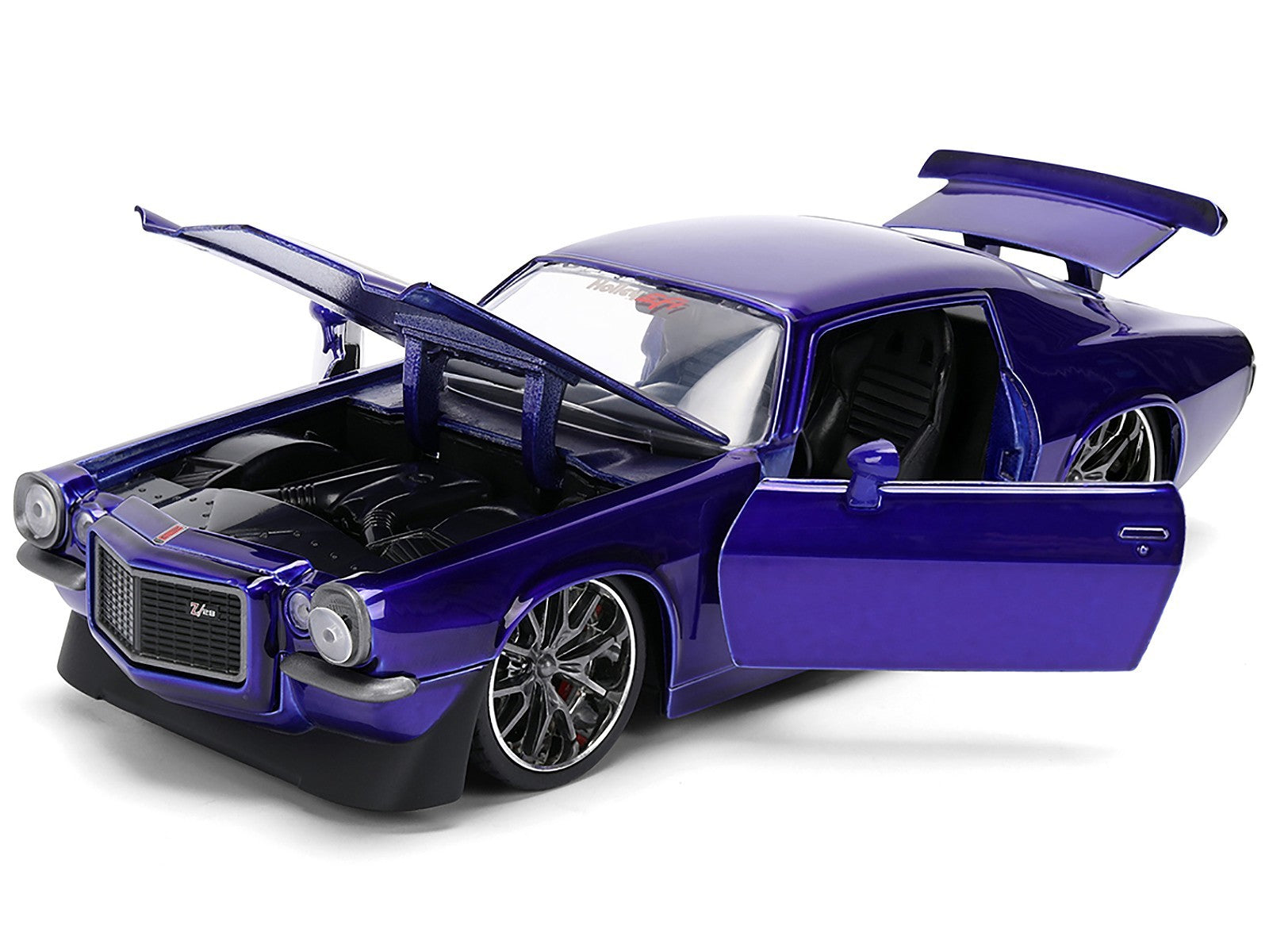 Model car with open doors on a white background