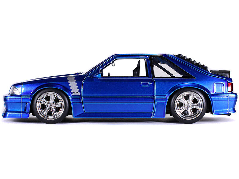 Blue model car on a white background