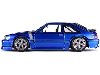 Blue model car on a white background