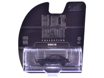 Model car in packaging with 'Black Collection' branding on a white background