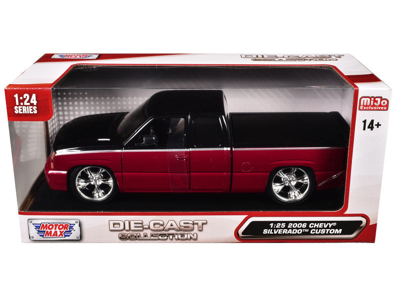Die-cast model truck in packaging with 'Motor Max' branding