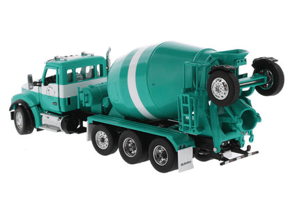 Green concrete mixer truck model on a white background