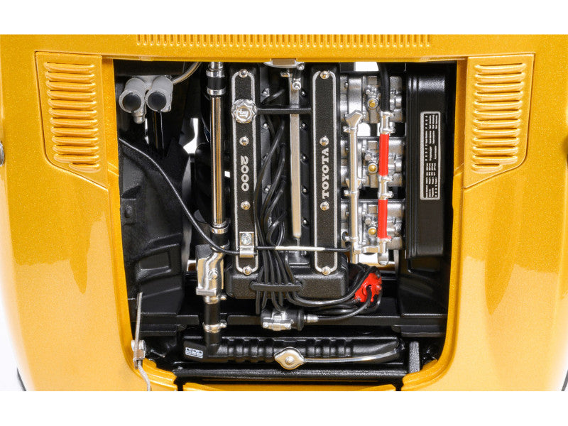 Close-up of a Toyota engine compartment with visible branding.