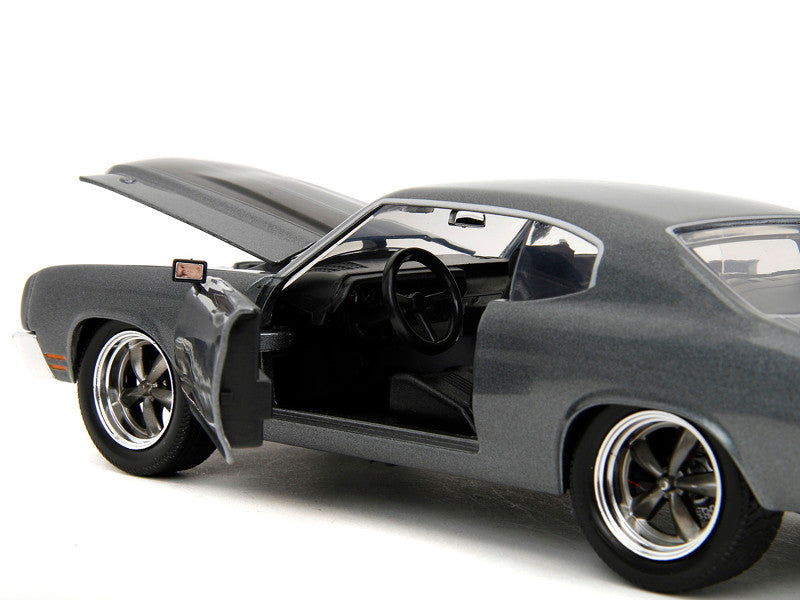 Model car with open doors on a white background