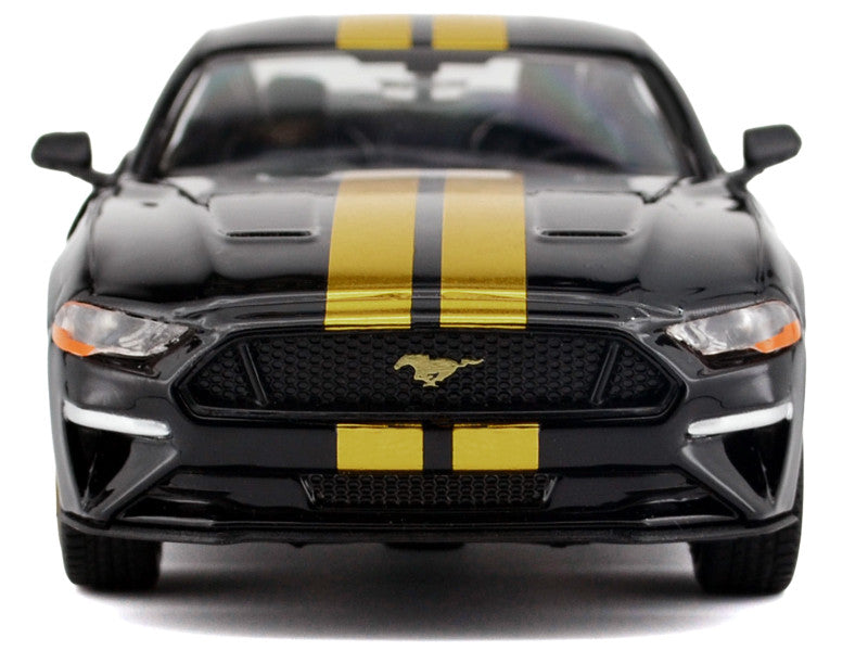 Black Ford Mustang with yellow stripes on a white background