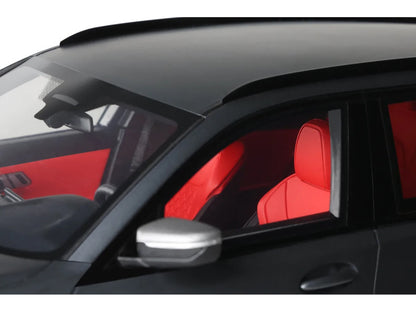 Car interior with red seat covers on a white background