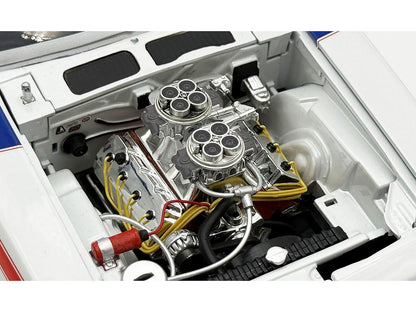 Close-up of a car engine with visible components and wiring.