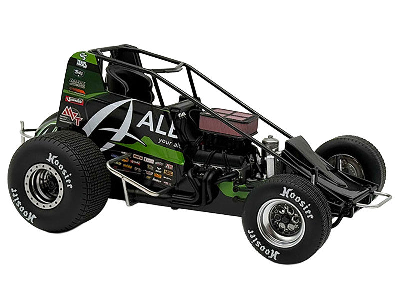 Green race car side view on white background