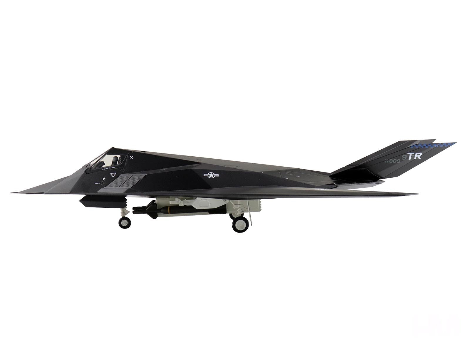 Black stealth aircraft on a white background